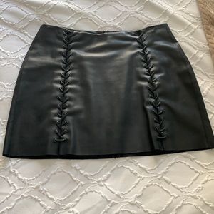 Black leather mini skirt by Lea & Viola size M.